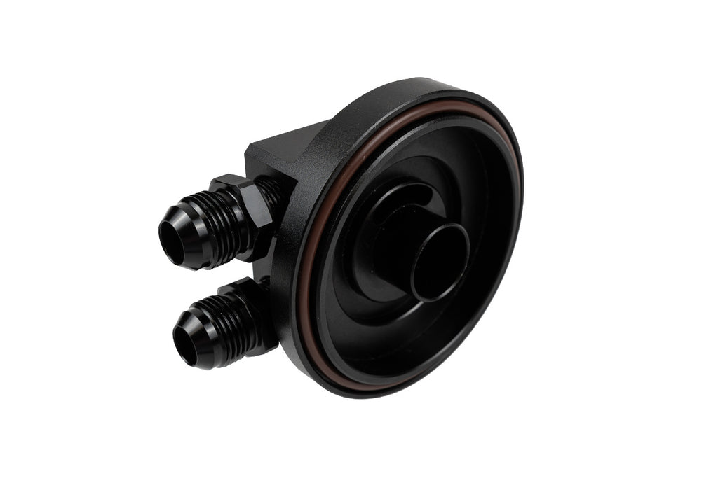 Oil filter adapter with outlet to the oil cooler for BMW engines